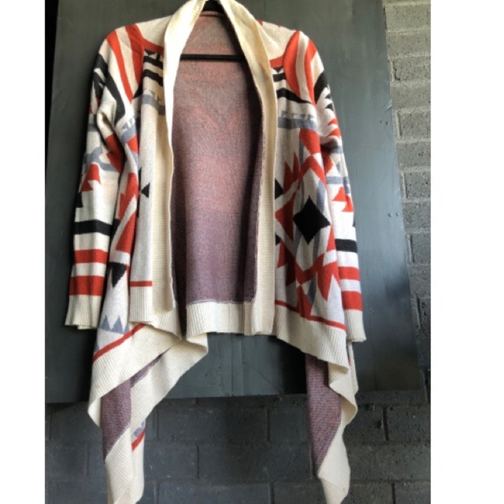 Sweater with waterfall opening